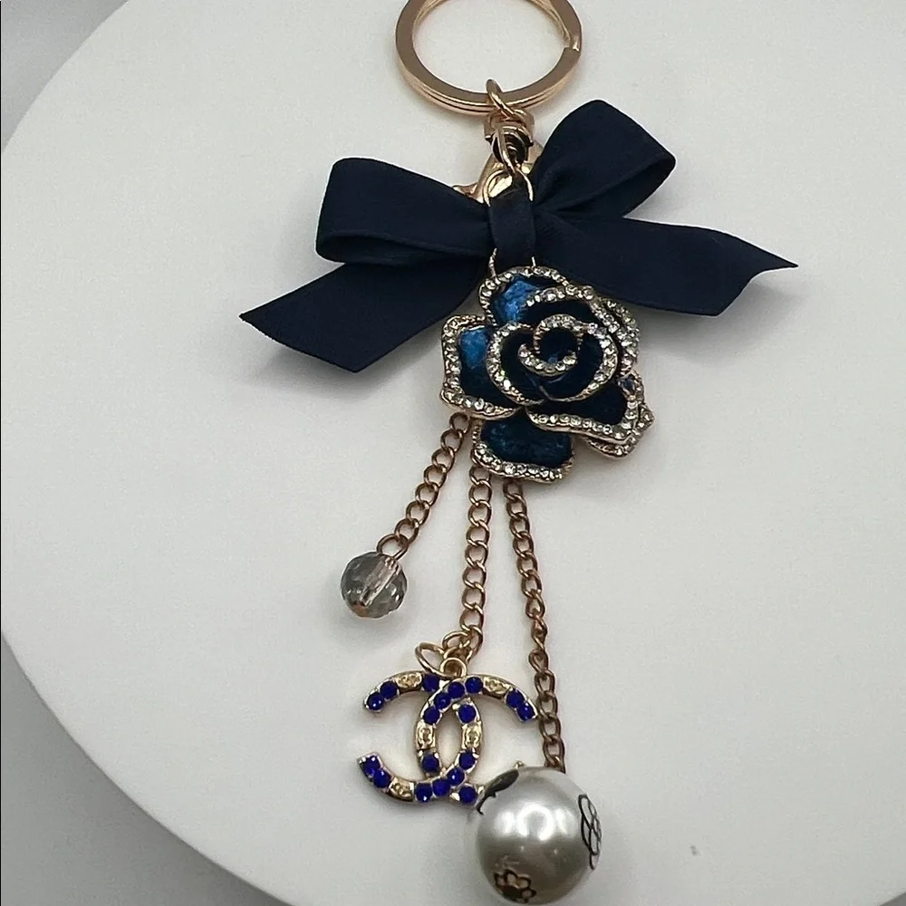 521. Blue and Gold Rose Keychain with Designer Charm - Picture 2 of 3